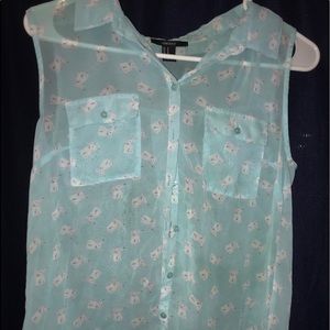 Very cute button up sleeveless see through top
